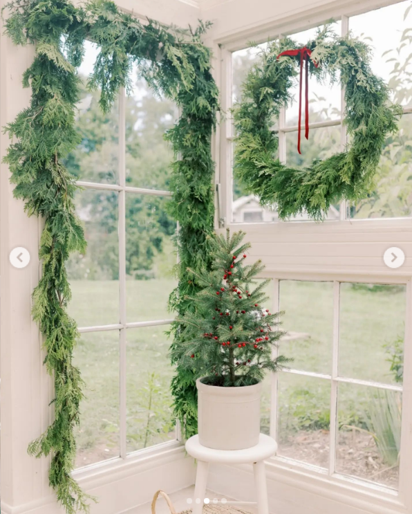 A Christmas wreath and decorations inside.