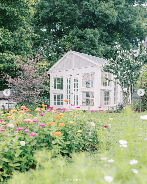 A greenhouse in a field.